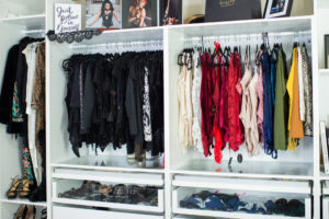 Boudoir photography client closet at Black Lace Boudoir featuring lingerie and shoes.